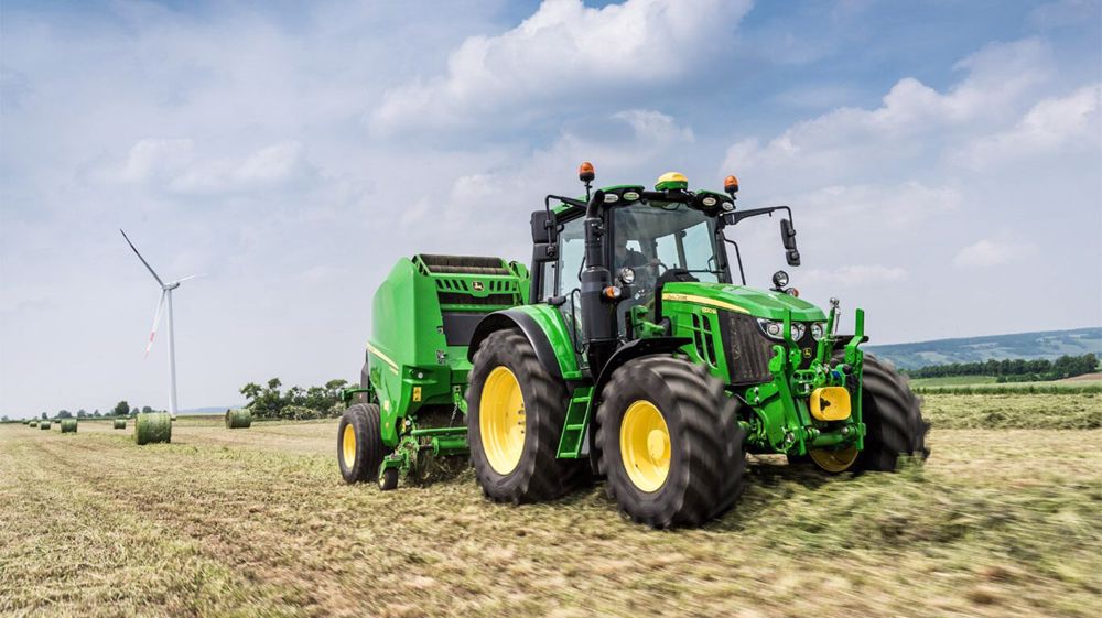 John Deere 6M : la variation continue sur l'accoudoir