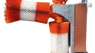 Une brosse à double rouleau Une brosse à double rouleau