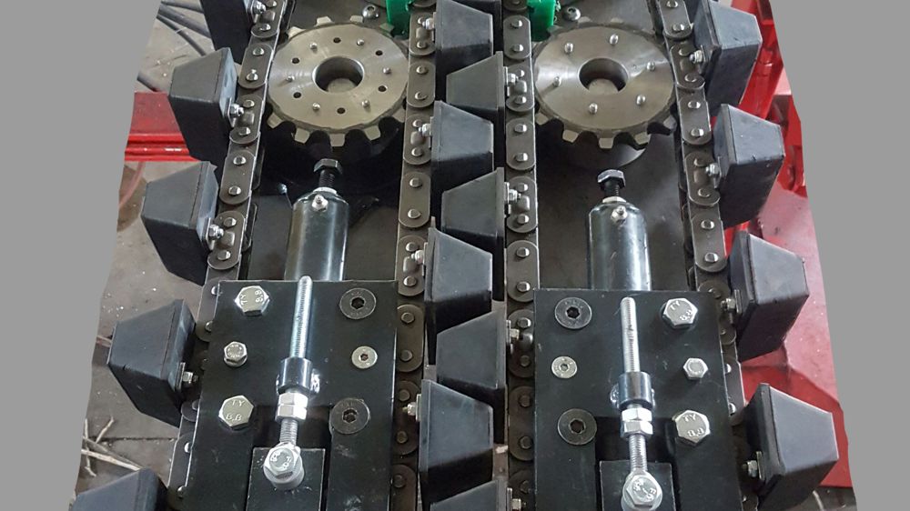 Un élément à chaînes à plots pour les cueilleurs à tournesol G-5000