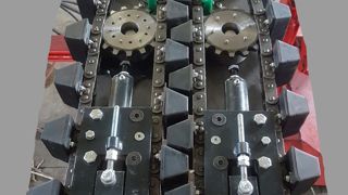 Un élément à chaînes à plots pour les cueilleurs à tournesol G-5000 Un élément à chaînes à plots pour les cueilleurs à tournesol G-5000
