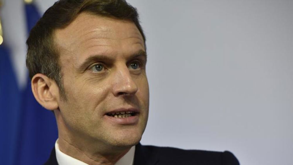 Le candidat Macron n’envisage pas de « produire moins »