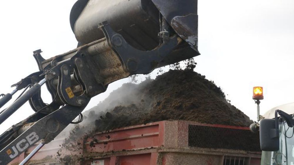 Chargement de digestat de méthanisation. © Vincent Gobert