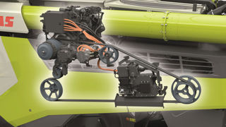 Le moteur électrique apporte 60 ch en supplément à l'entraînement de la moissonneuse-batteuse. Le moteur électrique apporte 60 ch en supplément à l'entraînement de la moissonneuse-batteuse.